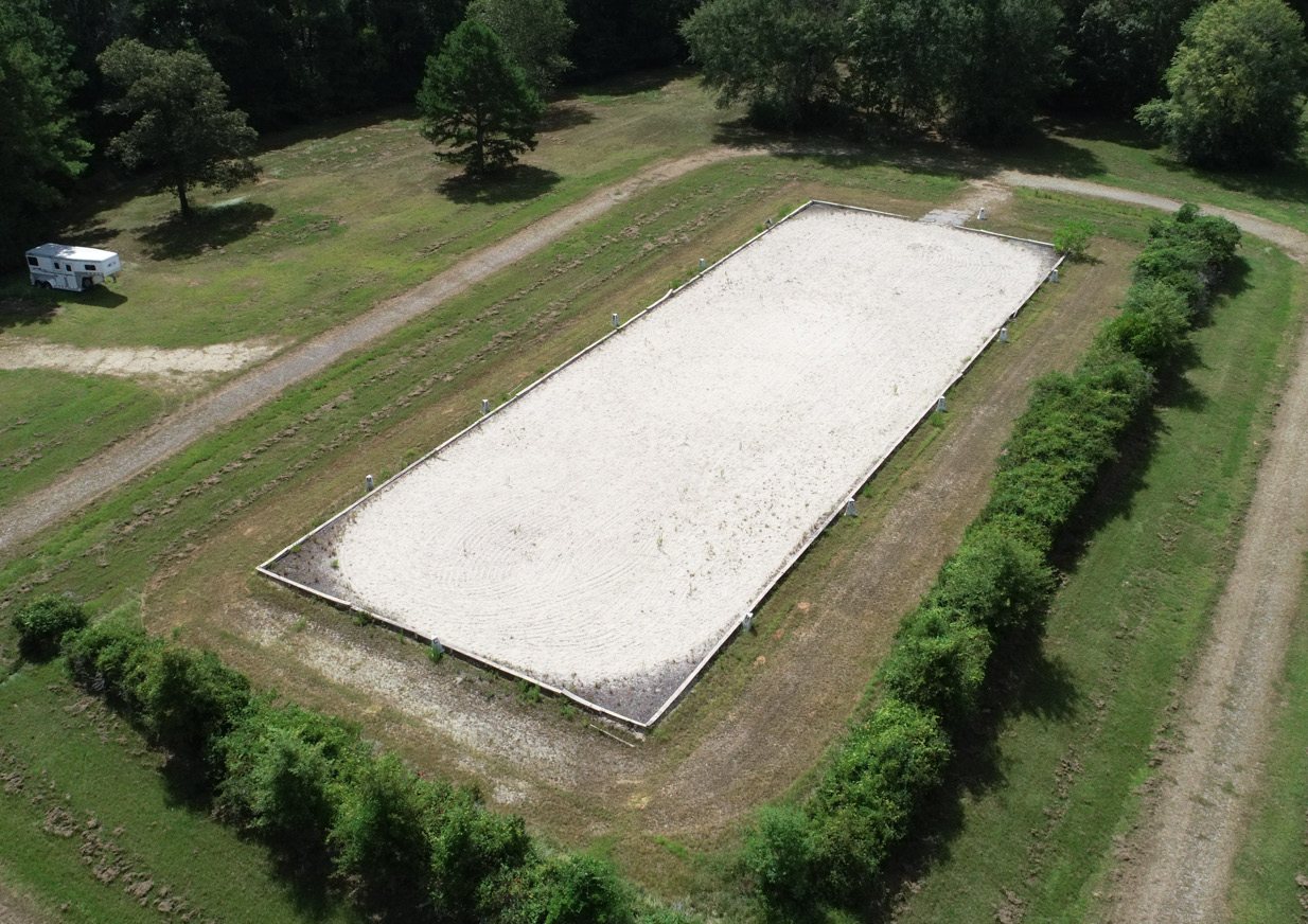 Outdoor dressage arena seen from above