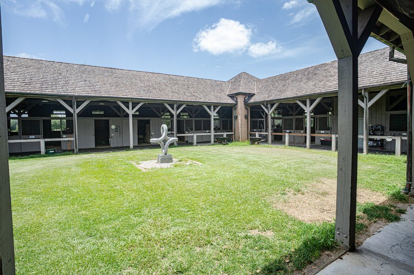 The primary stable complex courtyard with its central sculpture